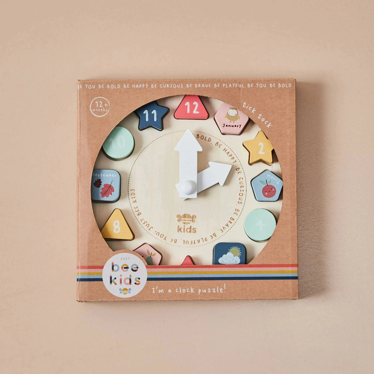 Holz Puzzle-Uhr mit Jahreszeiten und Zahlen in der Produktverpackung