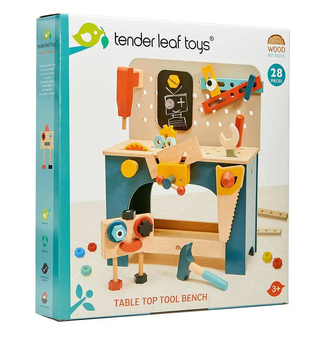 Verpackung der Werkbank aus Holz mit Abbildung der Werkzeuge, Bohrmaschine und verschiedenen Spielelemente.