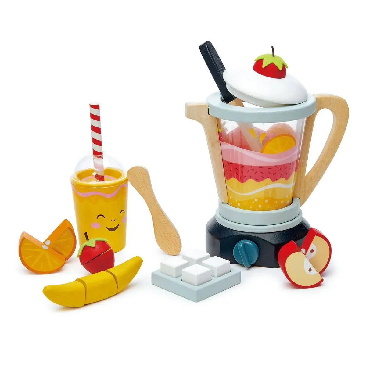 Fruchtmixer aus Holz mit Mixbehälter, Becher, Strohhalm, Messer und verschiedenen Früchten.